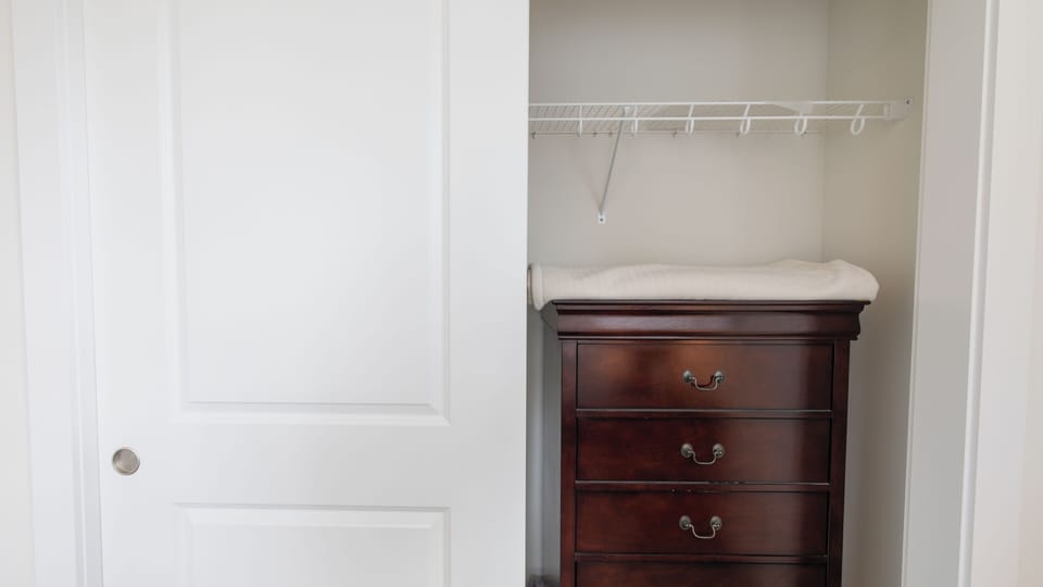 QUEEN BEDROOM CLOSET AND STORAGE DRESSER