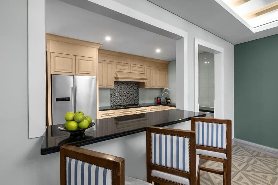 Villa, Balcony, Garden View | Private kitchen | Coffee/tea maker, coffee grinder, cookware/dishes/utensils, paper towels