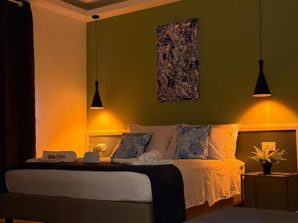 Deluxe Double or Twin Room | Down comforters, memory foam beds, in-room safe, desk