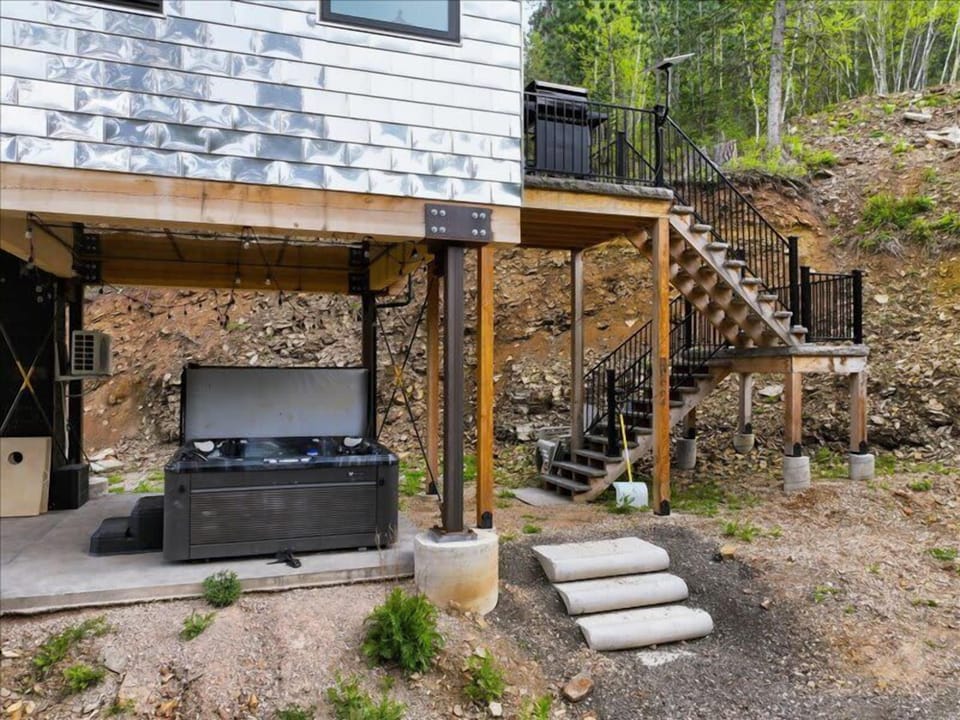 exterior with hot tub