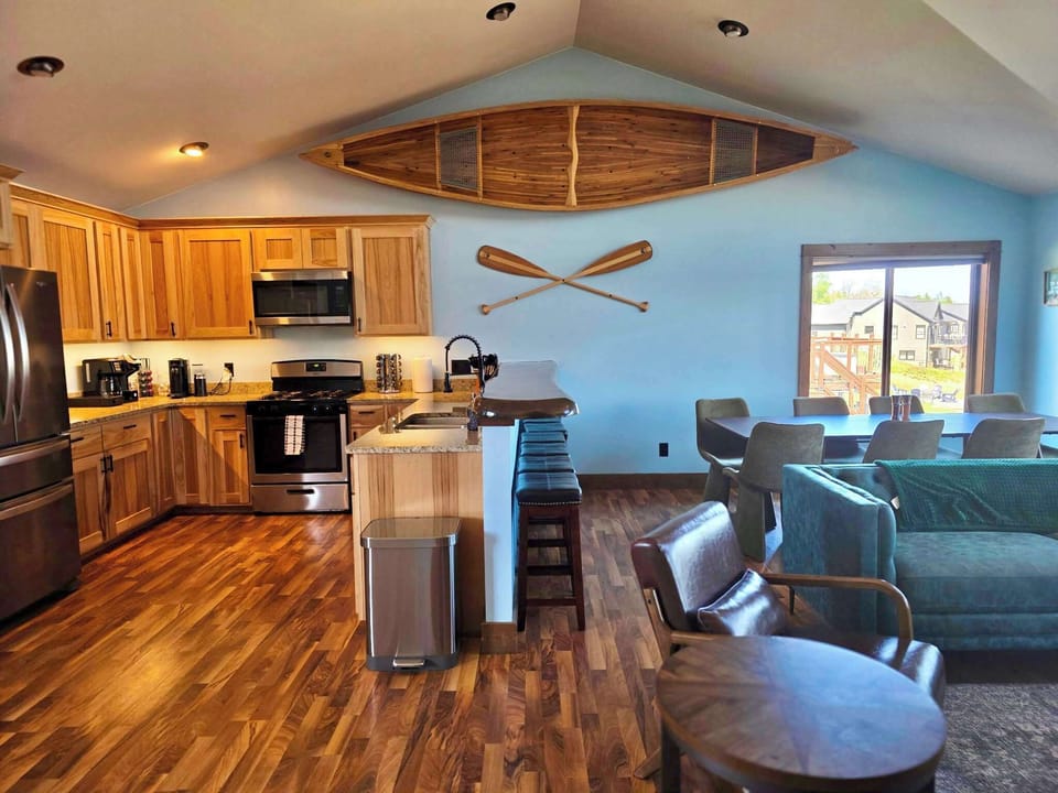 Our open concept floor plan creates the perfect gathering space for your group to cook, play games, or relax while watching TV together.
