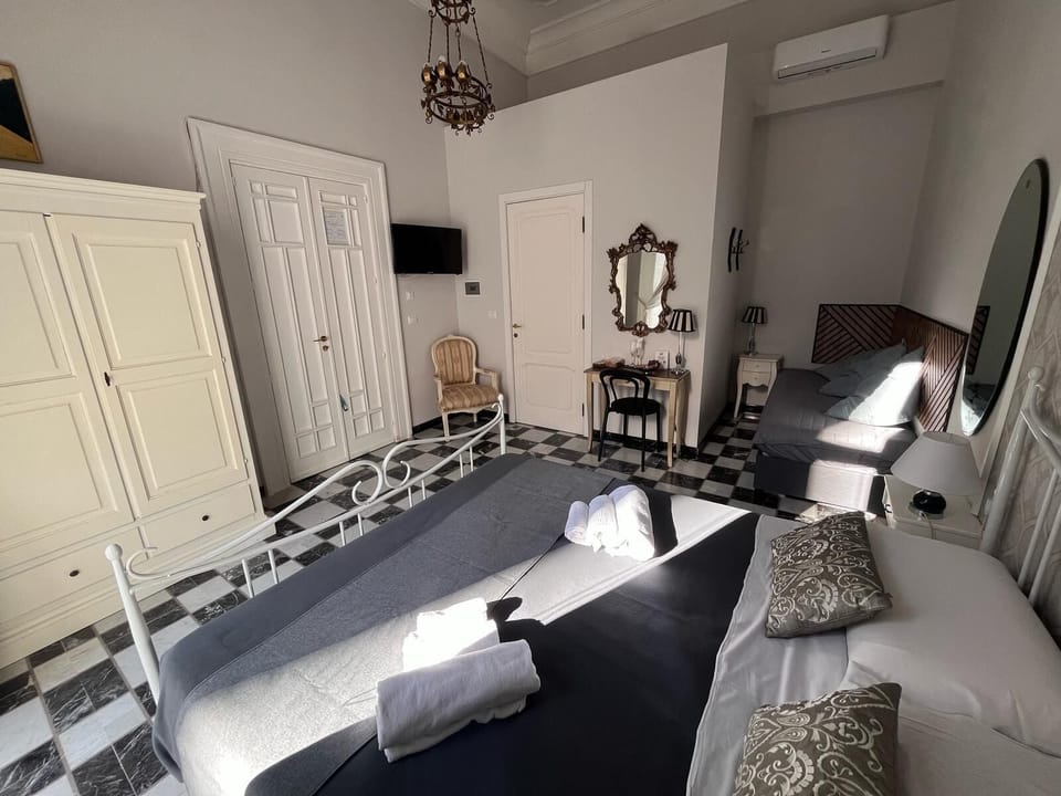 Superior Triple Room, Balcony, City View | In-room safe, free WiFi