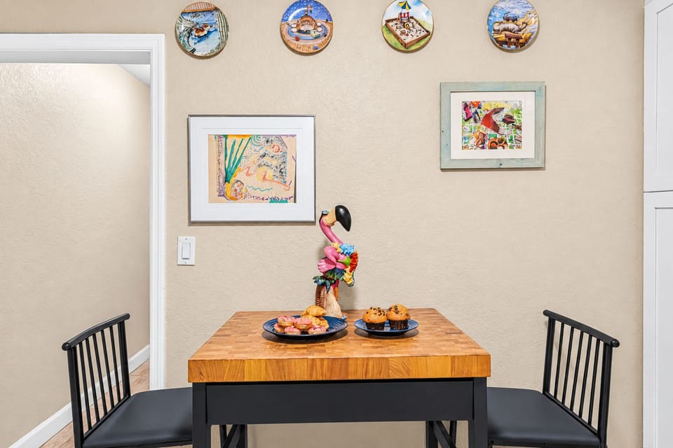 Charming dining nook with tasteful décor—great for intimate meals or morning coffee.