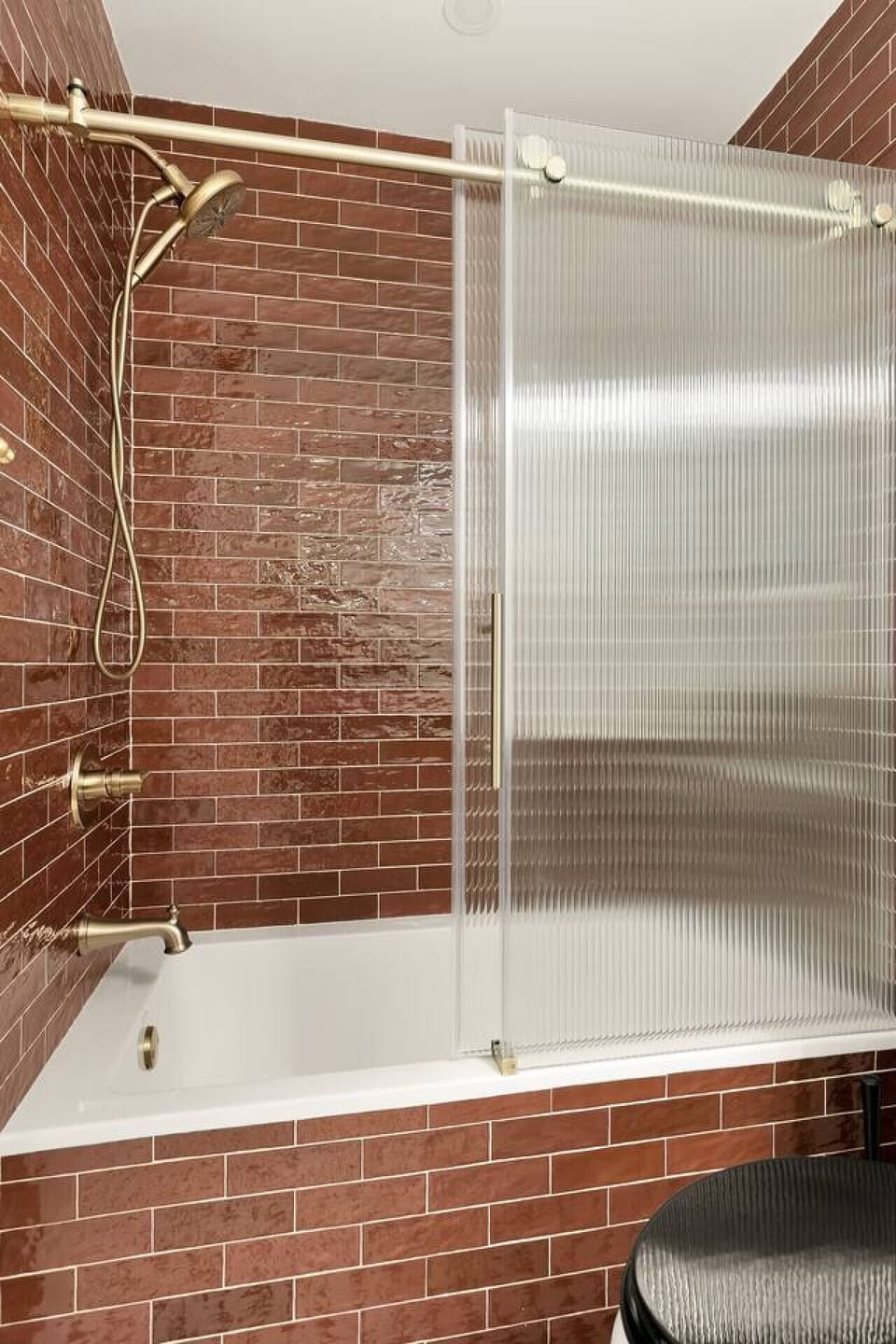 Upstairs bathroom with tub