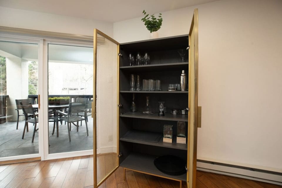 Stunning Bar Cabinet with Elegant Glassware