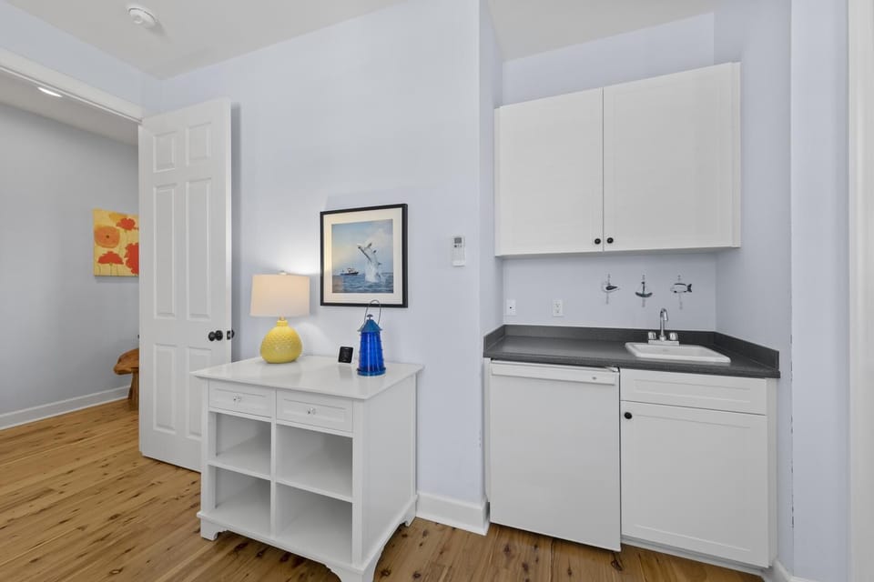 Cozy kitchenette with modern touches and ample storage