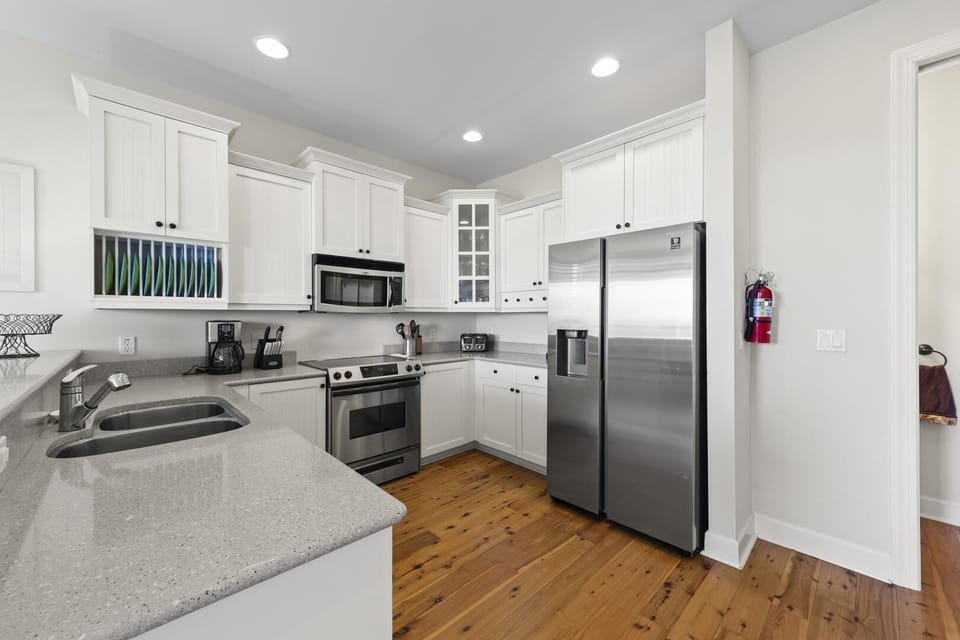 Modern kitchen with stainless steel appliances and spacious countertops