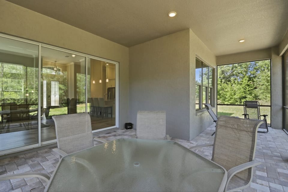 Patio | Screened Enclosure | Outdoor Seating | Yard Views