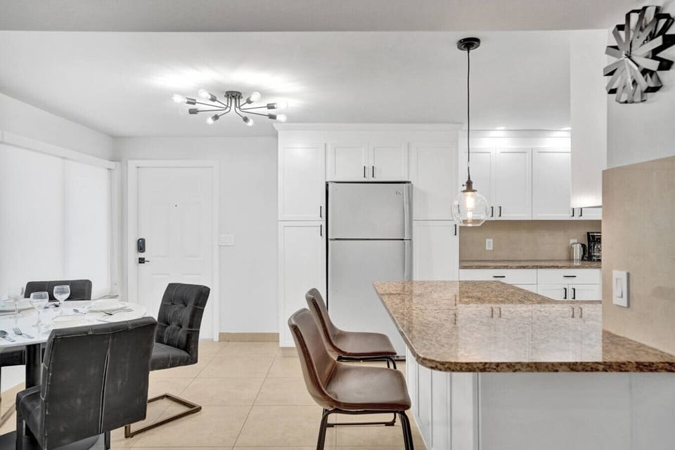 Spacious Kitchen with Bar Seating — Cook & Gather Easily