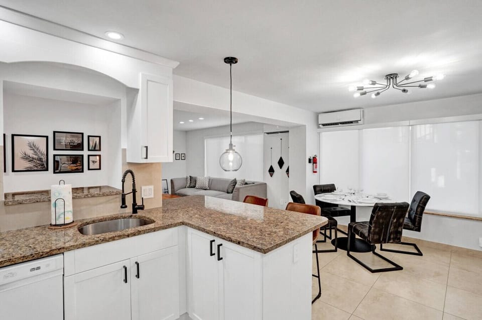 Spacious Kitchen with Bar Seating — Cook & Gather Easily