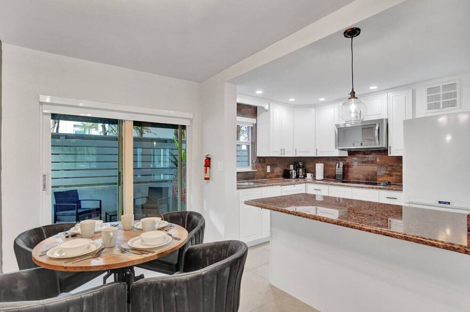 Spacious Kitchen with Bar Seating — Cook & Gather Easily