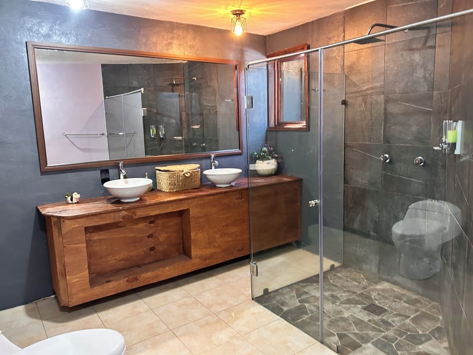 Family Cabin, Patio, Garden View | Bathroom | Shower, towels, soap, shampoo