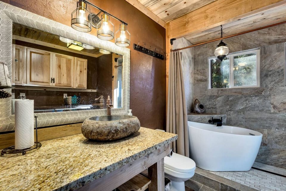 Take a relaxing soak in this peaceful, spa-style bathroom.