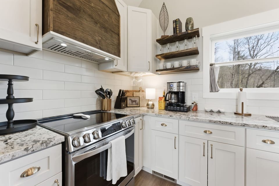 Cook in Style – This kitchen features high-end appliances, ample storage, and everything you need for a seamless culinary experience.