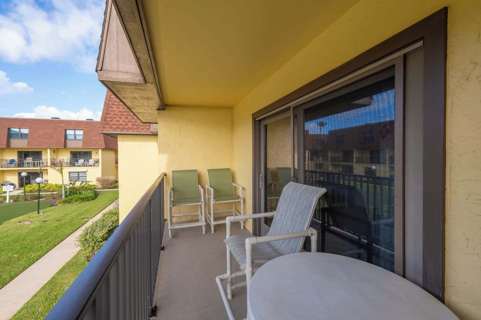 Balcony with Seating Overlooking the Courtyard and Gardens