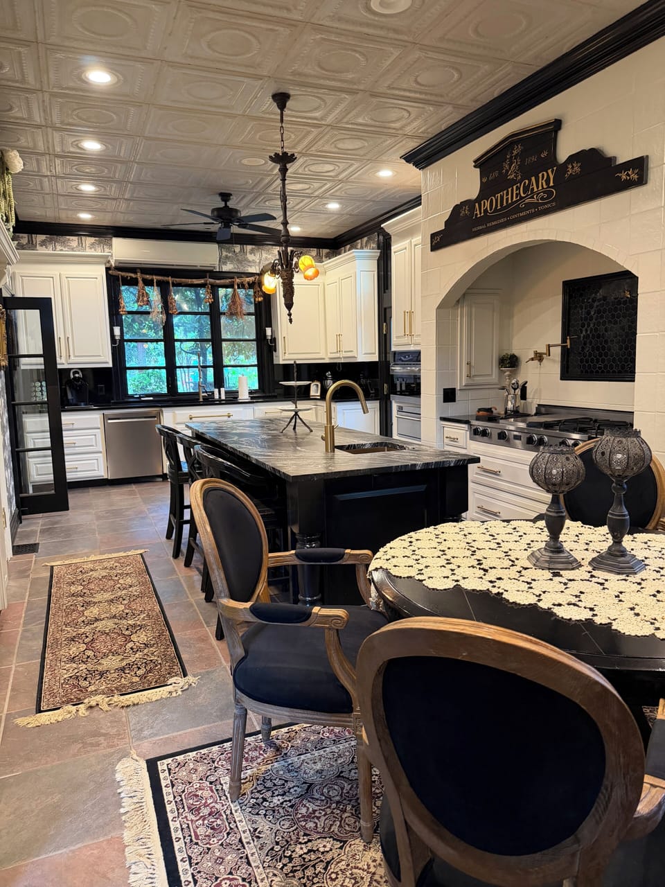 The Gourmet Kitchen intimate dining table for four and island for three 
