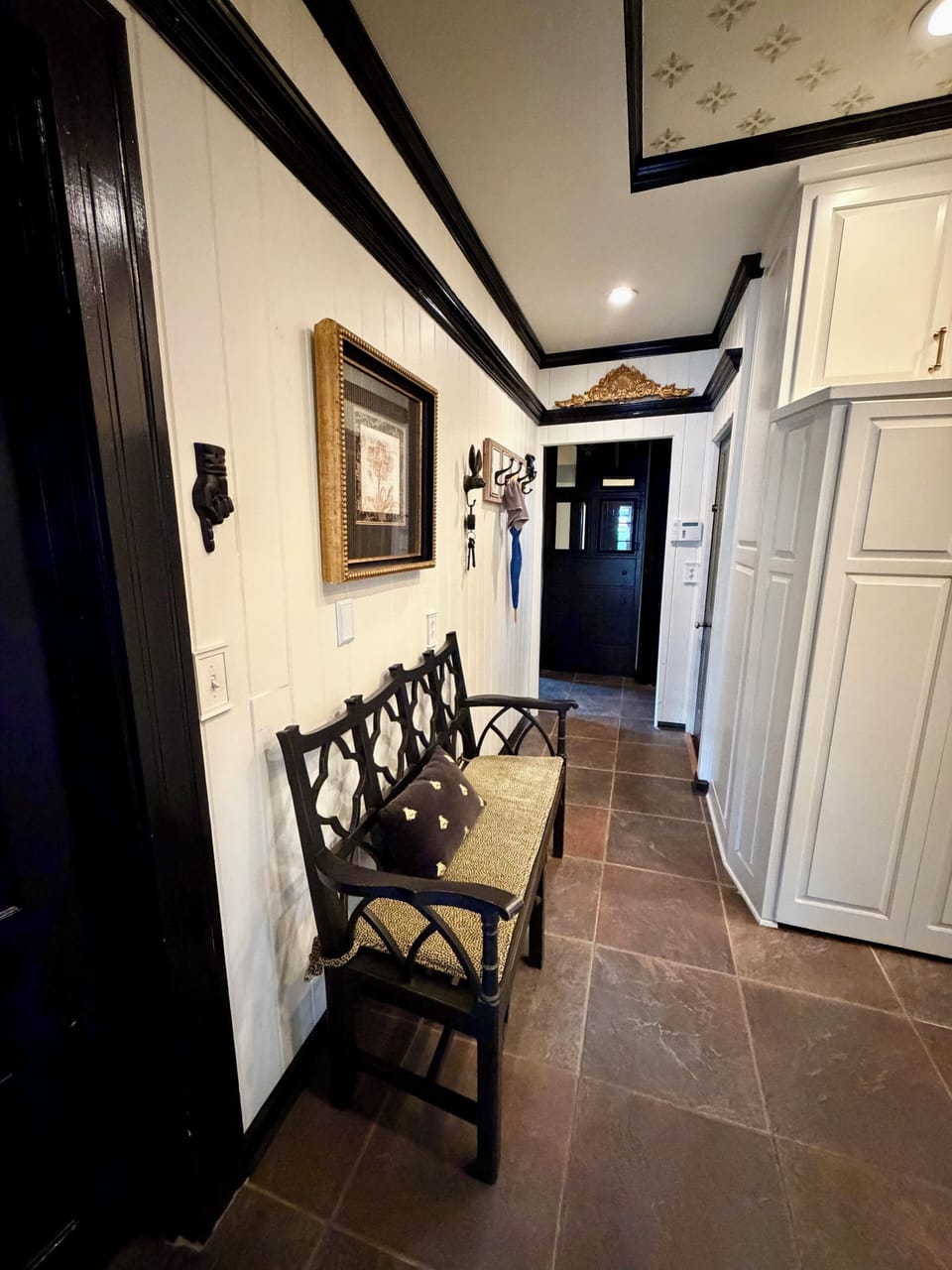 back exit hall to laundry room, gourmet kitchen & intimate dining