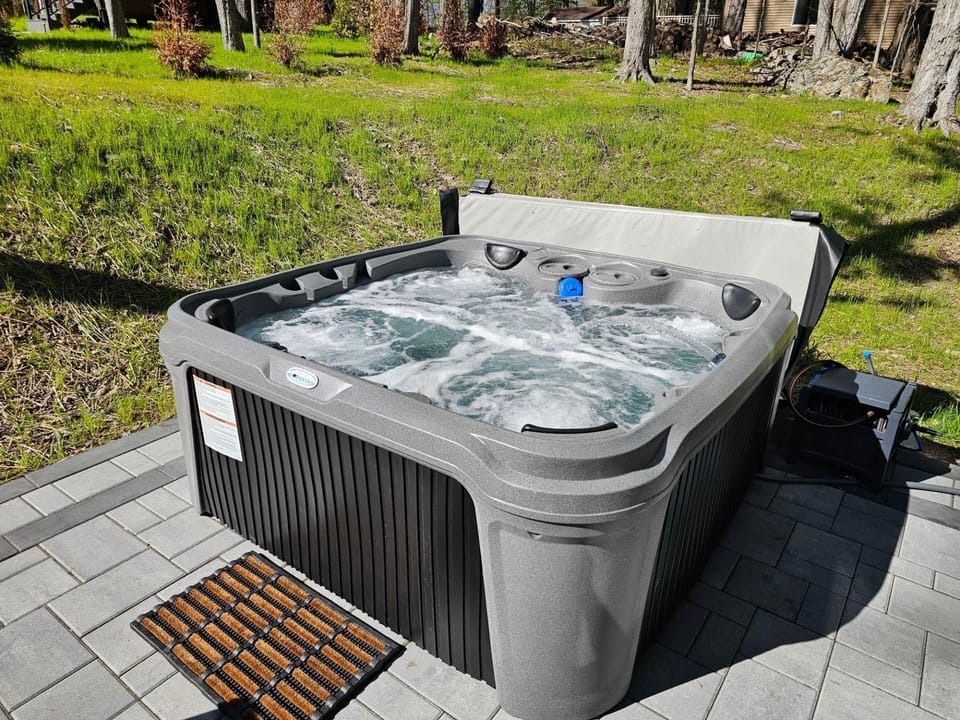 Enjoy a relaxing time in the hot tub. Up to six people will fit comfortably