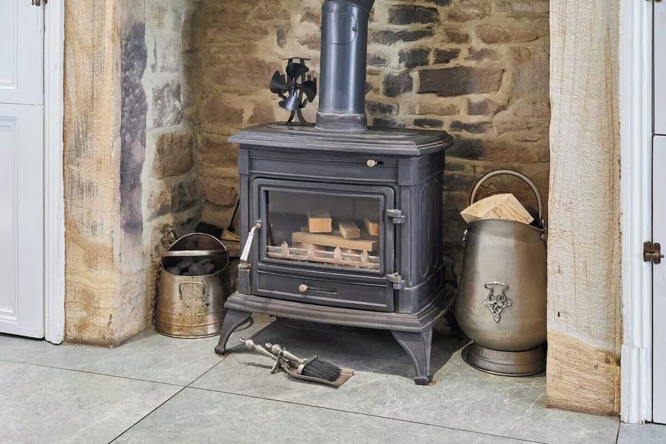 Inglenook fireplace to kitchen/lounge area 