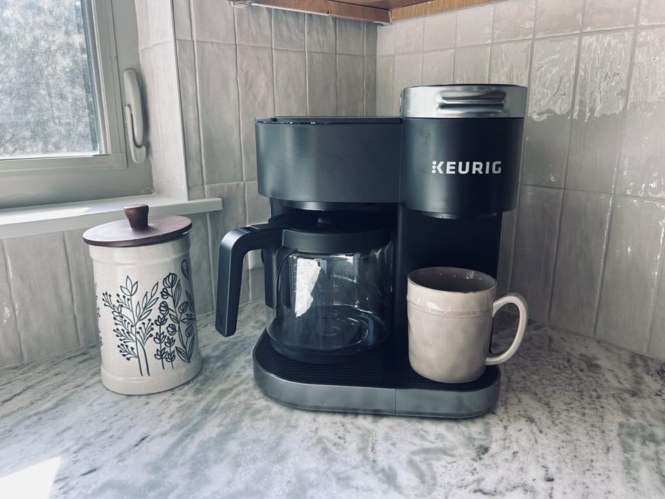 Limited Keurig pods supplied as well as coffee filters, sugar & creamer. 