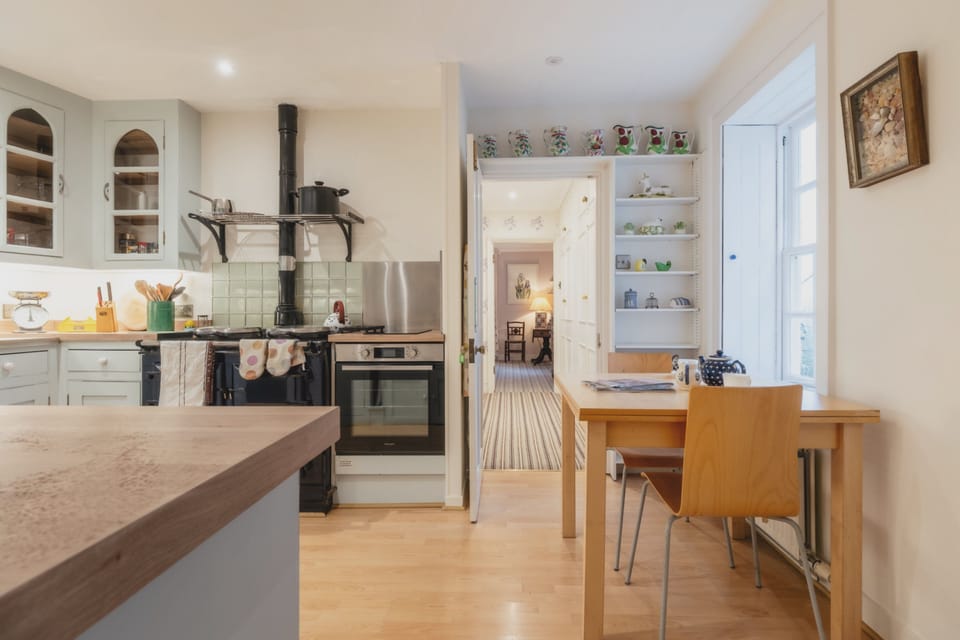 The stylish and spacious kitchen with breakfast dining area