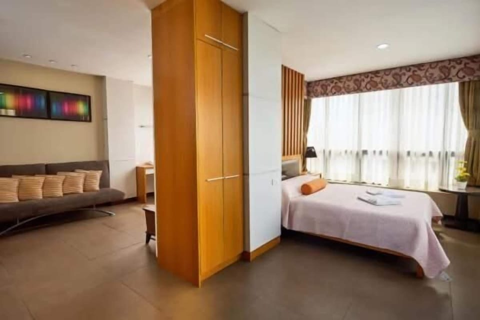 Family Suite, City View | In-room safe, desk, laptop workspace