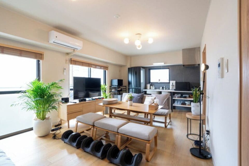 Comfort Apartment | Living area | 50-inch flat-screen TV with digital channels, video-game console