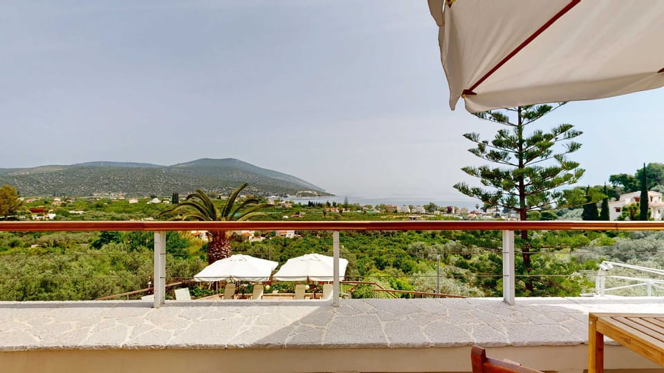 Covered Terrace with Views of the Surrounding Hills