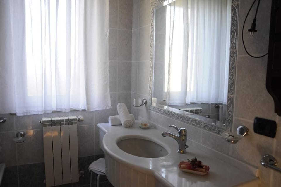 Double Room, Balcony, Pool View | Bathroom | Bathtub, hair dryer, bidet, towels