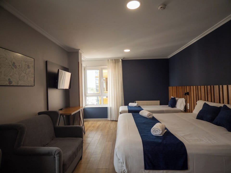 Family Triple Room, City View | Desk, free WiFi