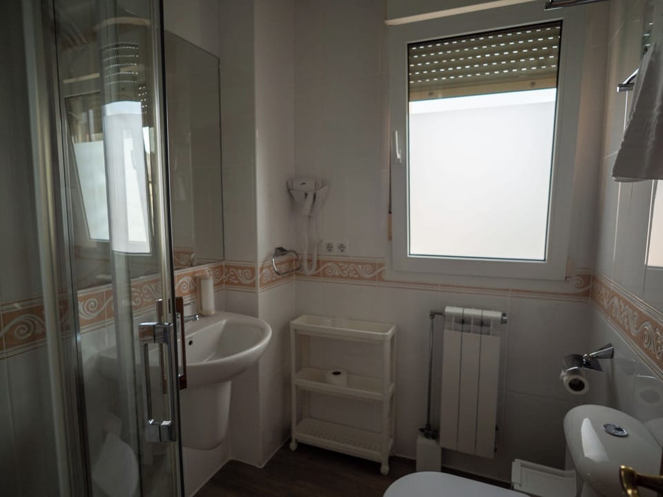 Family Triple Room, City View | Bathroom | Towels, soap, shampoo, toilet paper