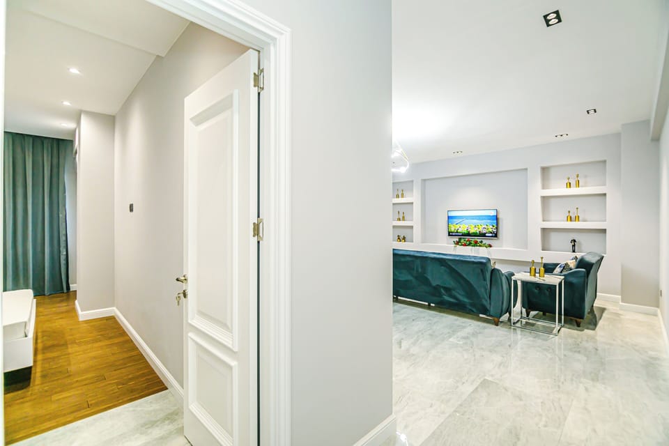 Deluxe Triple Room | Living area
