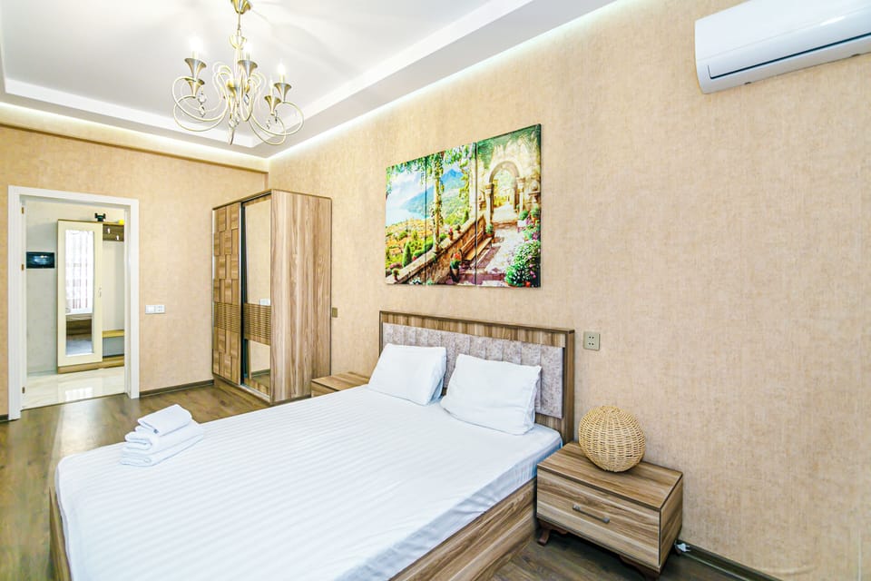 Deluxe Triple Room | Laptop workspace, iron/ironing board, free WiFi
