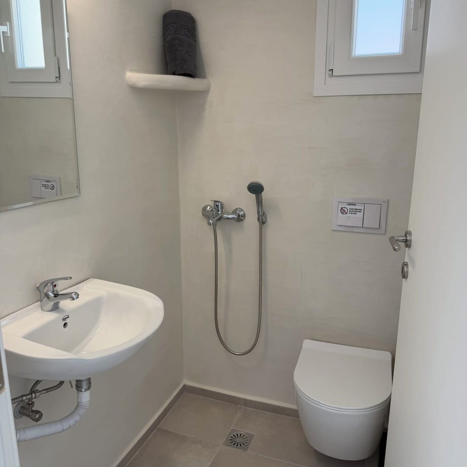 Family Quadruple Room, Patio | Bathroom | Shower, hair dryer, towels, soap