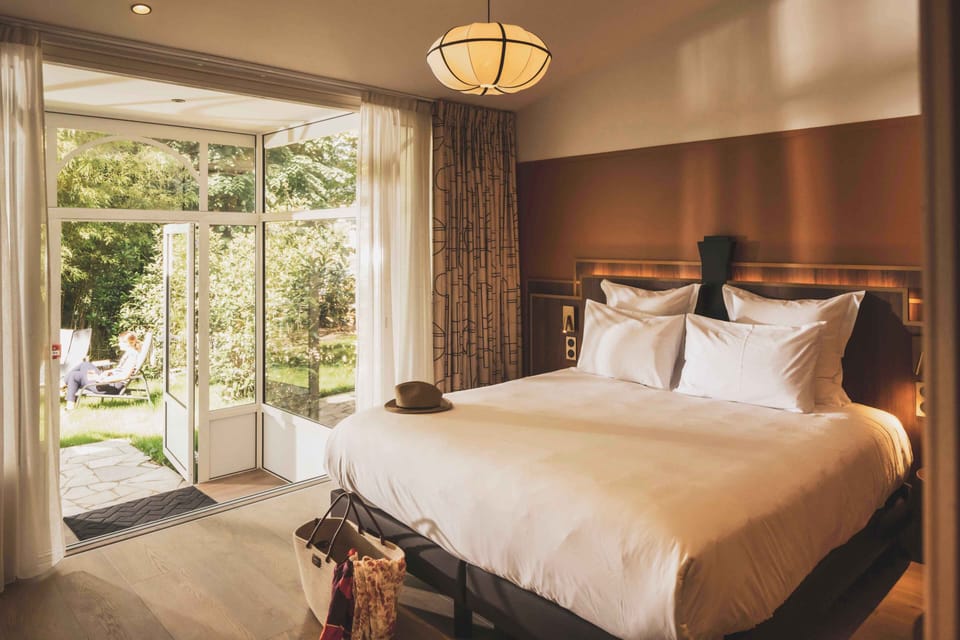 Wake up to peaceful garden views in a spacious room designed for calm and comfort.
