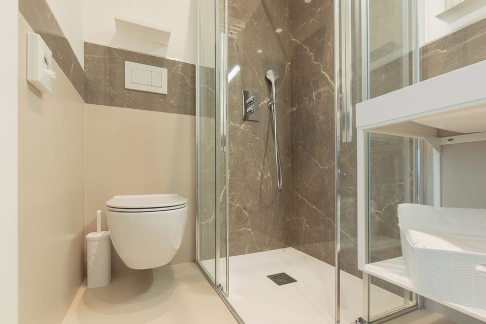 Bathroom | Shower, hair dryer, bidet, towels