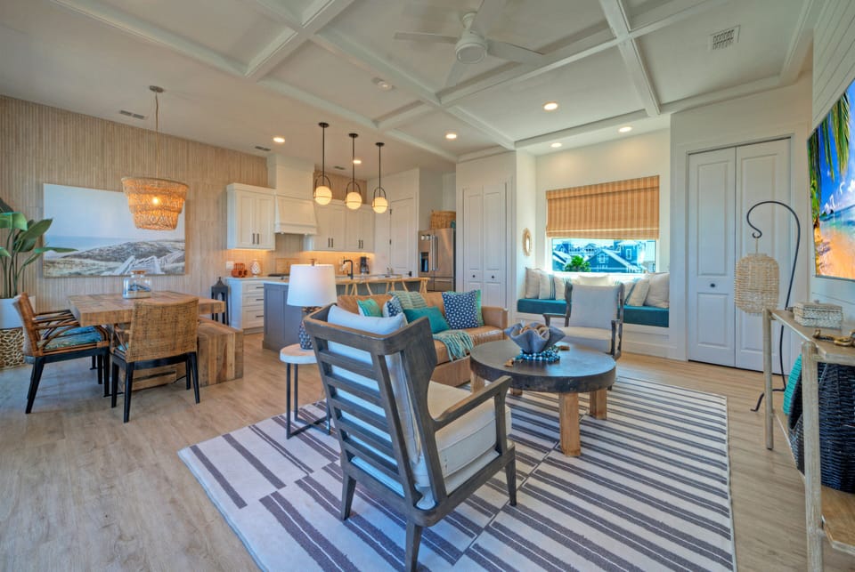 Inviting coastal living space with warm textures and a relaxed beach‑house vibe.