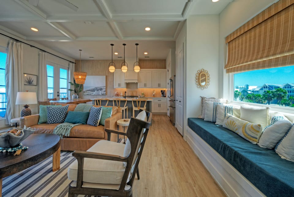 Inviting coastal living space with warm textures and a relaxed beach‑house vibe.