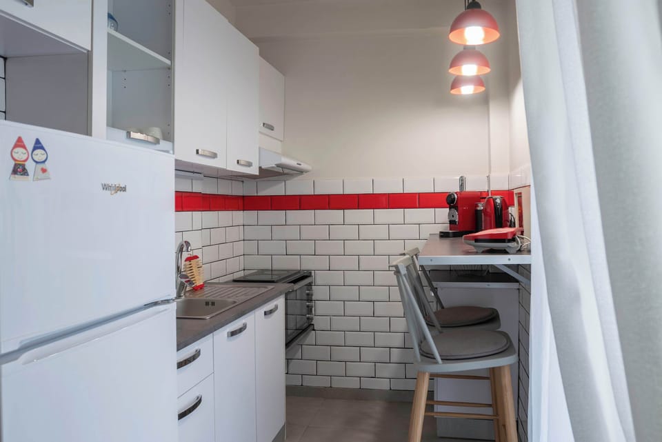 Sleek kitchen with counter space and quality appliances.