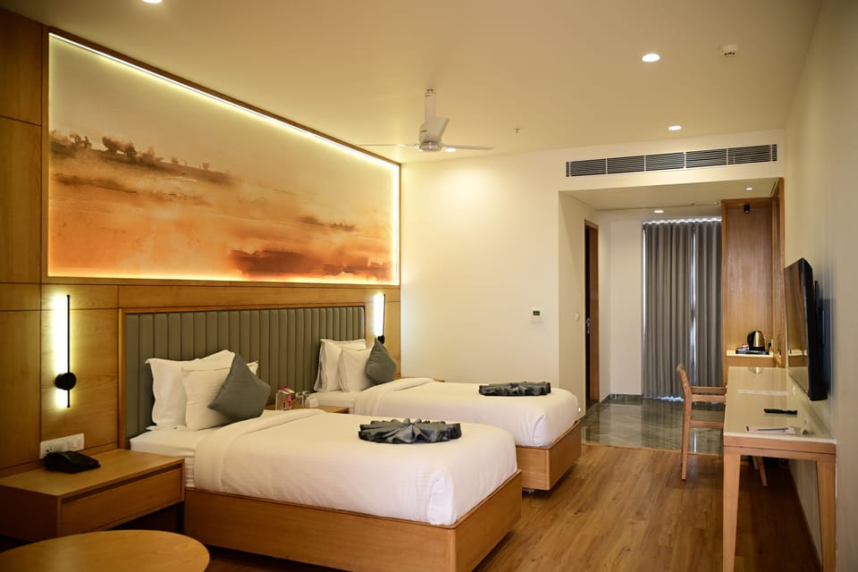 Deluxe Double or Twin Room, City View | Minibar, desk, iron/ironing board, free WiFi
