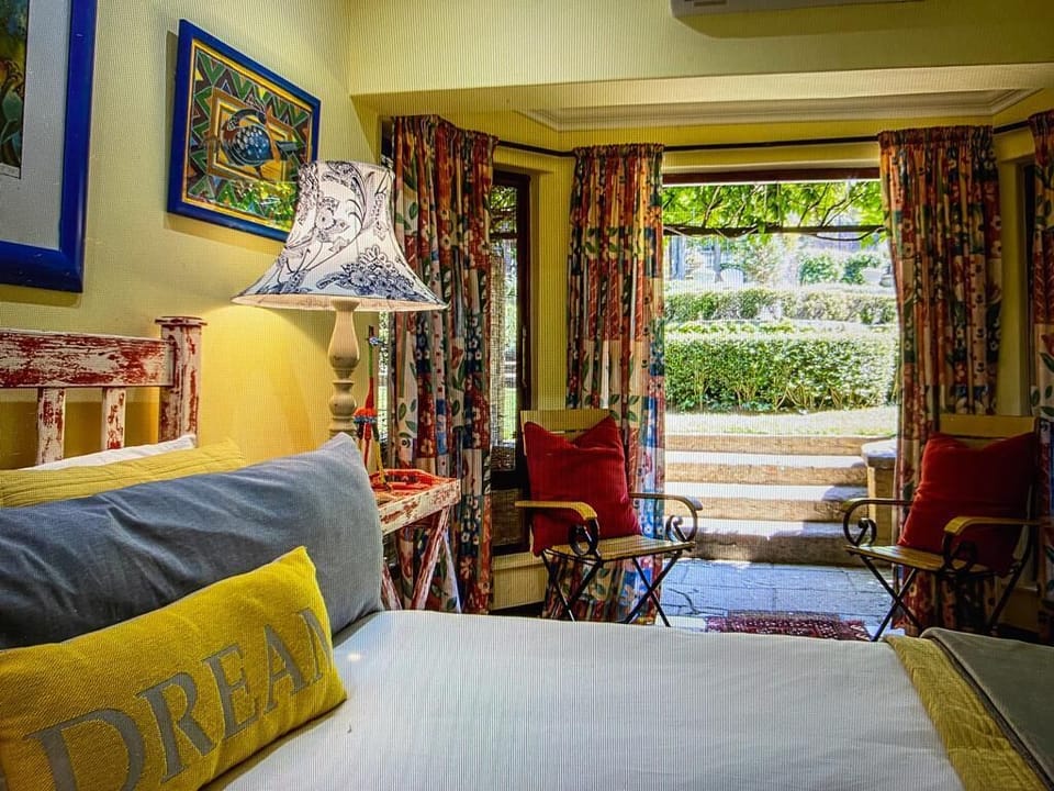Family Suite, Patio, Garden View | In-room safe, iron/ironing board, WiFi (free)