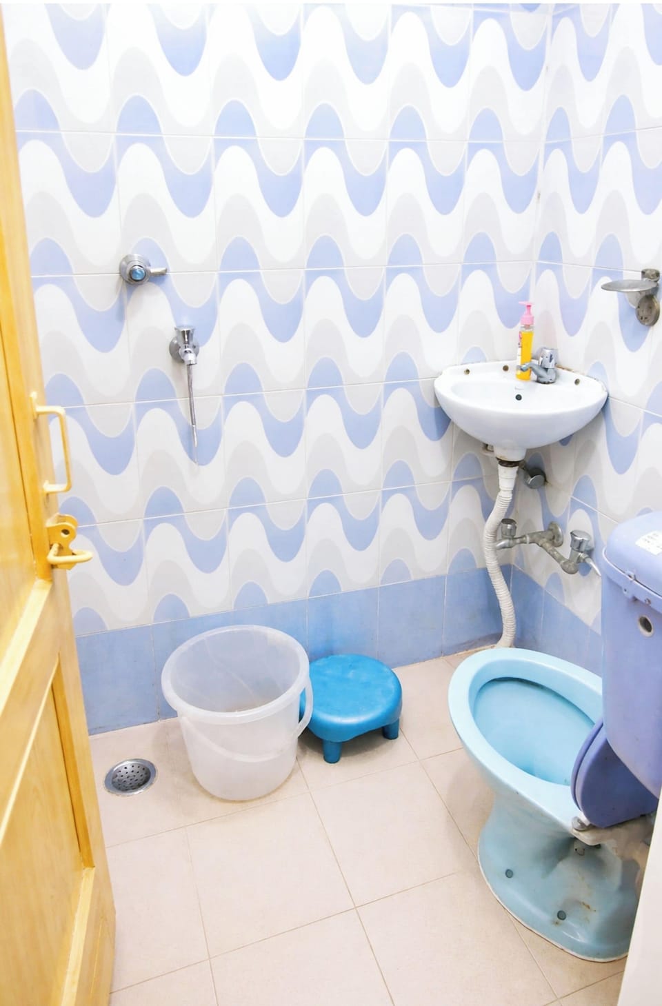 Shower, rainfall showerhead, slippers, towels