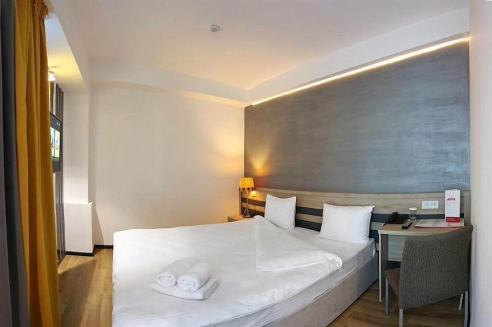 Standard Single Room, City View | In-room safe, blackout drapes, soundproofing, iron/ironing board