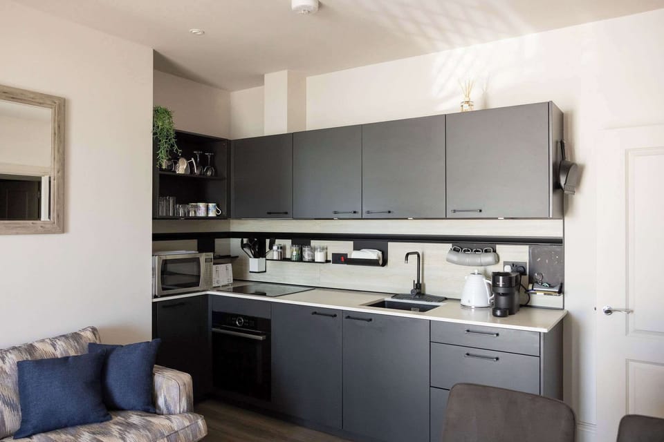 A modern, well-equipped kitchen makes relaxed coastal stays easy and enjoyable.