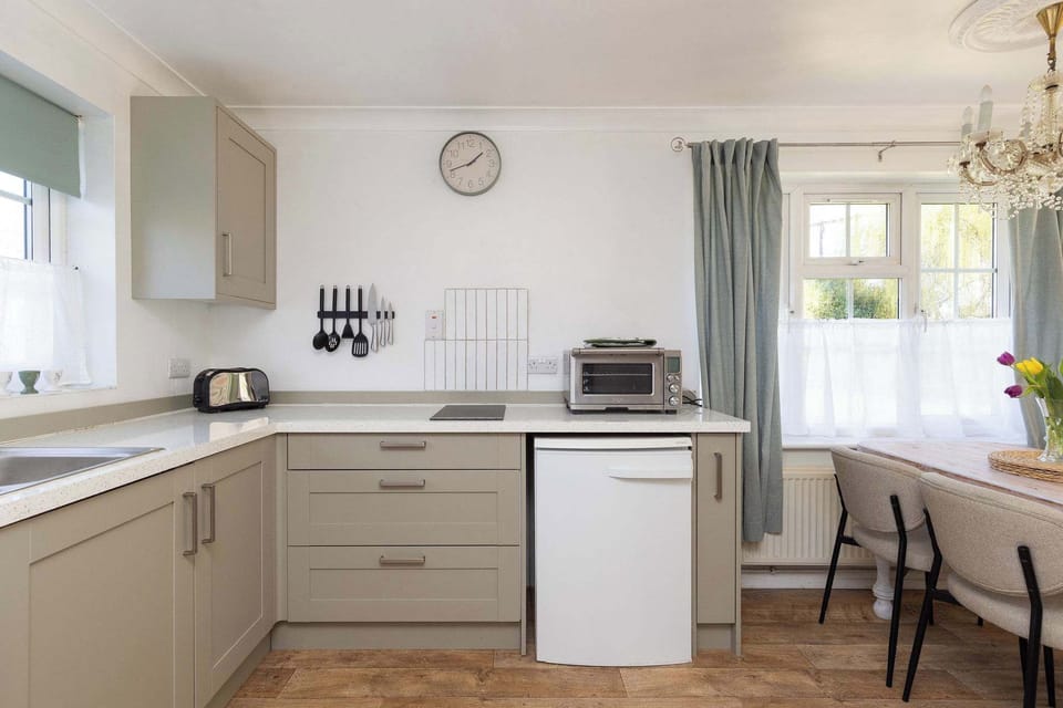 Open-plan living and dining create a practical, stylish base for couples or small families.