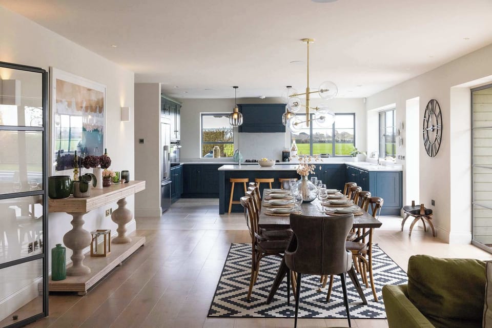 Gather in the spacious open-plan kitchen and dining area, designed for sociable entertaining.