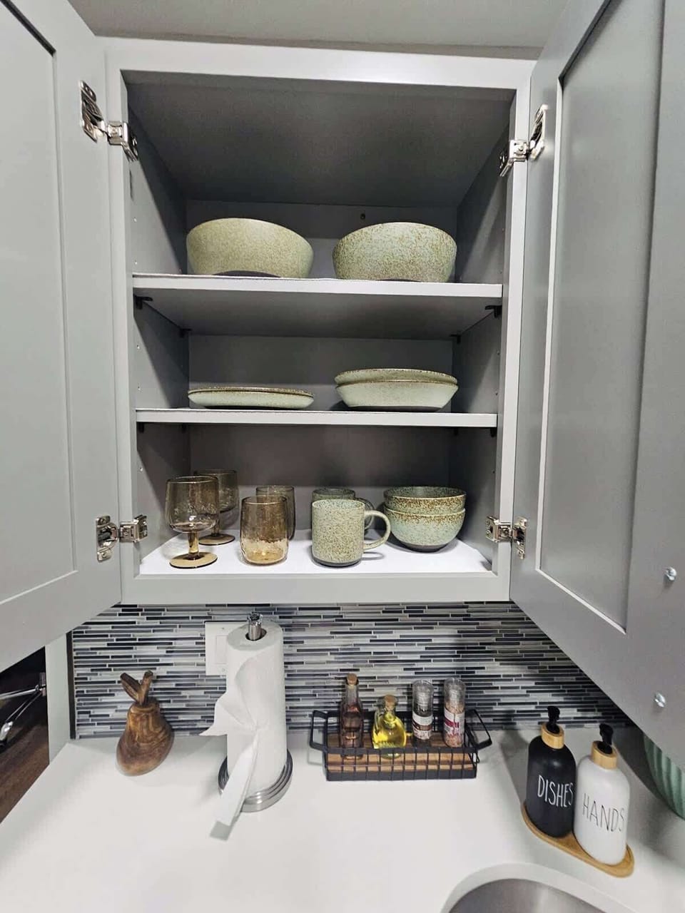 For your convenience, the kitchenette is stocked with salad plates, cereal bowls, dinner plates, soup bowls, wine glasses, regular cups, and mugs.