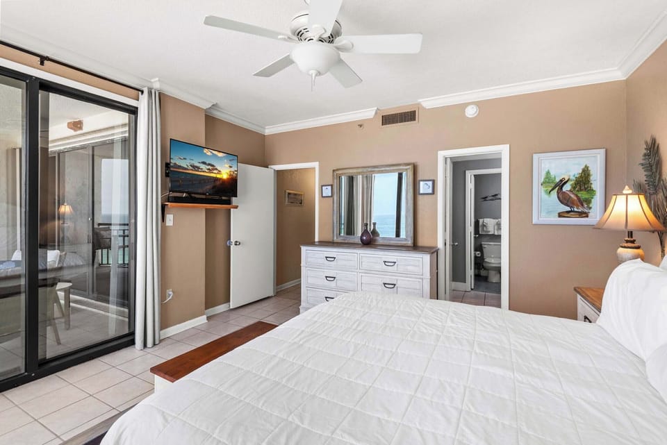 Primary king suite with balcony access
