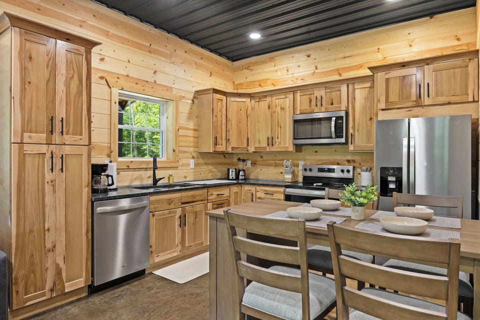 Kitchen 2: The heart of the home! Our open kitchen and dining area are perfect for gathering, sharing stories, and making memories.