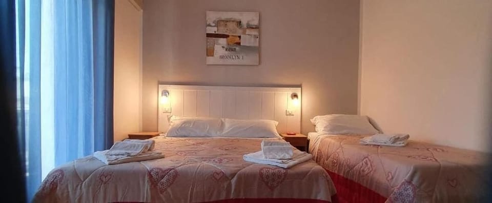 Triple Room, Balcony, City View | In-room safe, free WiFi
